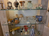 Vintage glassware and porcelain figurine collection on glass shelves - thumbnail 4 of 5