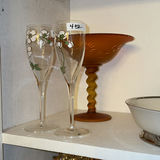 Assorted decorative shelf items: glassware, ceramics, sign and cork figurines - thumbnail 2 of 6