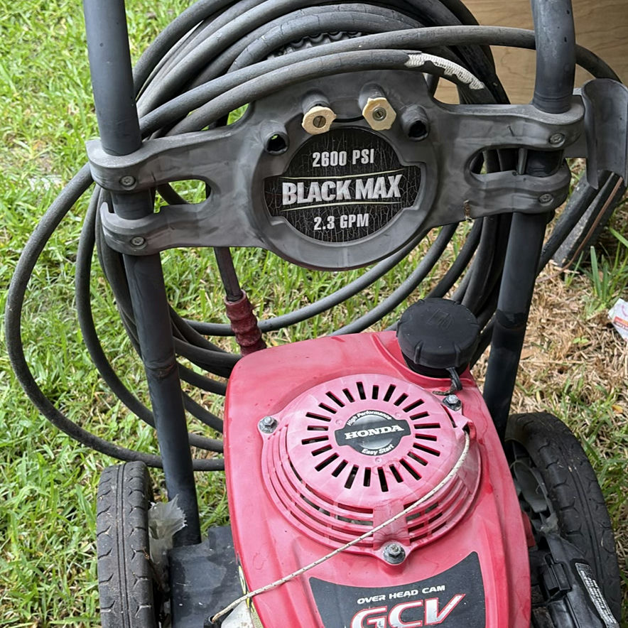 Red Black Max pressure washer with Honda engine and two red gasoline cans - image 3 of 6
