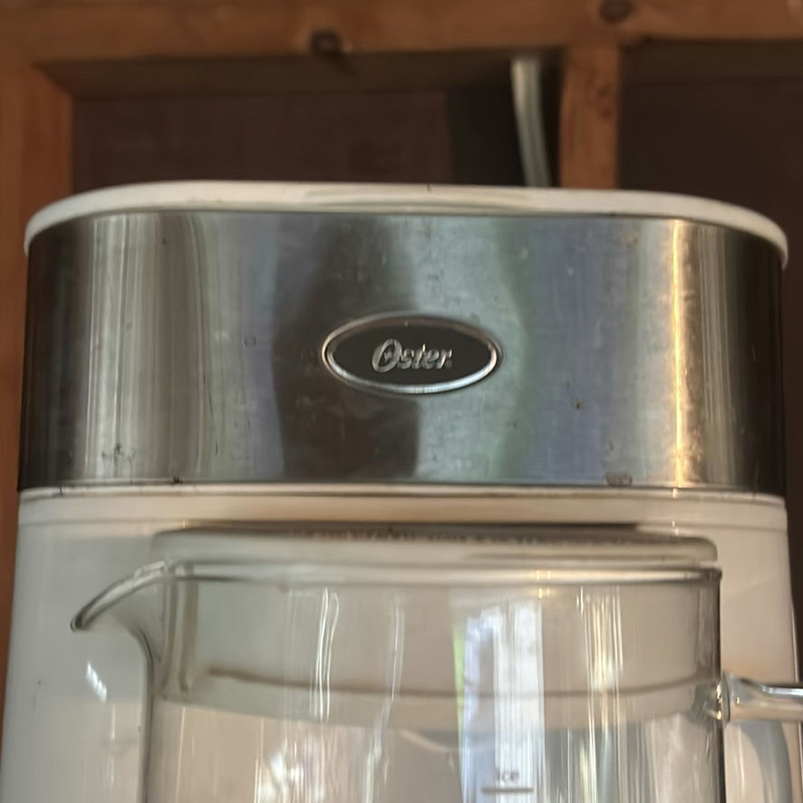 Oster coffee maker with glass carafe, utensil jar, and bead storage organizer - image 2 of 4