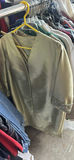 Assorted women's clothing on a rack - thumbnail 11 of 13