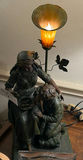 Bronze-toned figurine sculpture, round clock, glass frame, and jewelry box - thumbnail 4 of 4