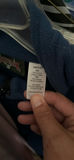 Wedding dress and assorted clothing on a garment rack - thumbnail 4 of 15