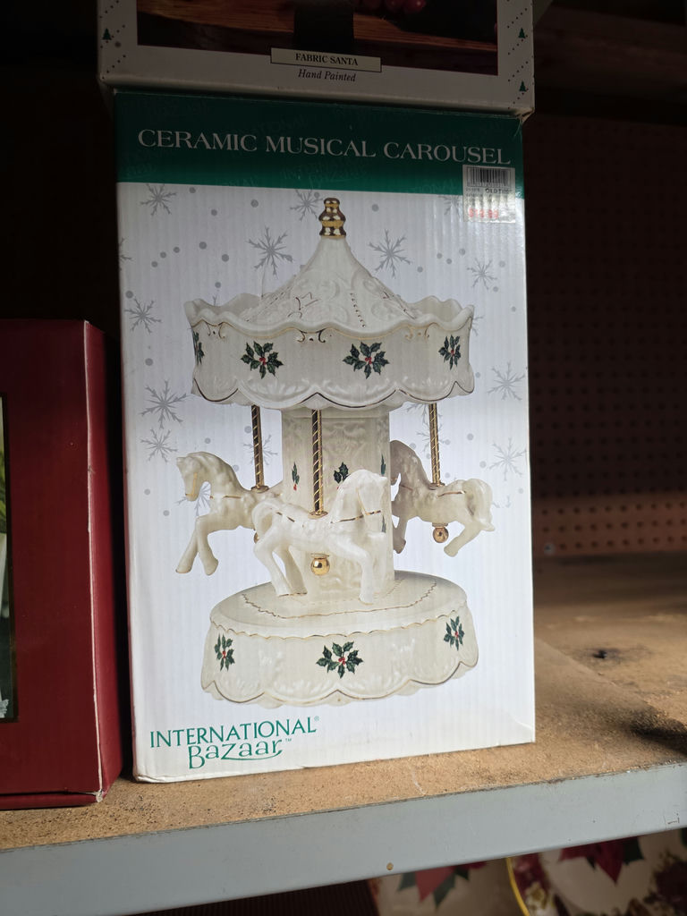 Assorted Christmas-themed decor and vintage photo albums - image 2 of 19