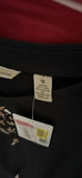 Wedding dress and assorted clothing on a garment rack - thumbnail 2 of 15