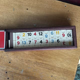 Rummikub game in wooden case with decorative box and tassel accessory - thumbnail 2 of 6