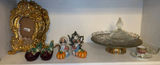 Assorted decorative home items: ornate frames, figurines, and glassware - thumbnail 1 of 7