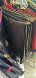 Assorted women's clothing on a rack - thumbnail 10 of 13
