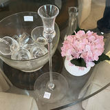 Clear glass teacups with saucers, champagne flute, decanter, and pink hydrangea centerpiece - thumbnail 2 of 5