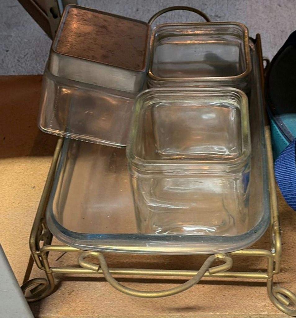 Glass bakeware, ornate wooden tray, and leather roll organizer - image 1 of 6