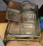 Glass bakeware, ornate wooden tray, and leather roll organizer - thumbnail 1 of 6
