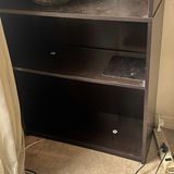 Tall black bookshelf with glassware - thumbnail 2 of 3