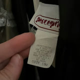 White bridal gowns and formal wear on hangers - thumbnail 4 of 4
