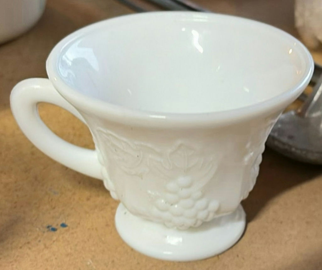 Casserole dish with lid, embossed glass mugs, grape-relief cup, diamond-pattern vase, and ornate framed tile art - image 8 of 9