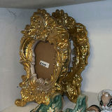 Assorted decorative home items: ornate frames, figurines, and glassware - thumbnail 2 of 7