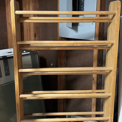 Red Dirt Devil MVP Vacuum Cleaner and Wooden Slatted Storage Rack - Image 1 of 4