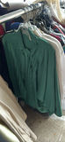 Assorted women's clothing on a rack - thumbnail 12 of 13
