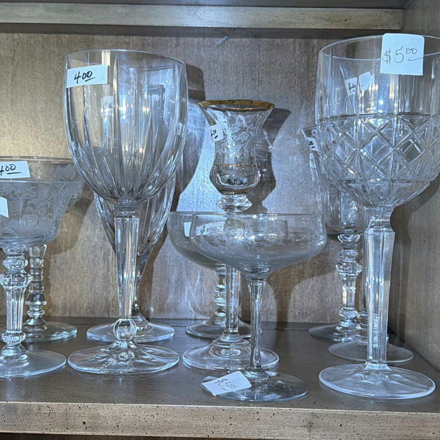 Assorted glassware: champagne flutes, wine glasses, goblets, and a crystal pitcher - image 2 of 8