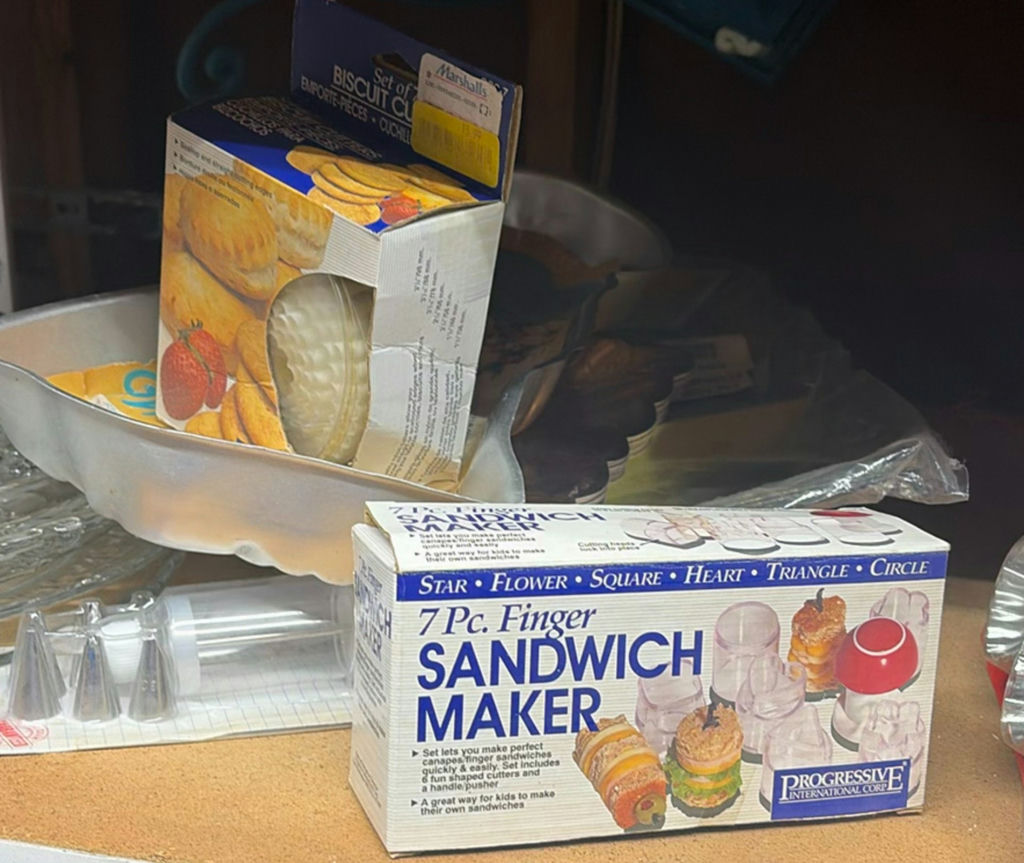 Glass cake stands, ornate metal stands, jars, and sandwich maker kit - image 3 of 5
