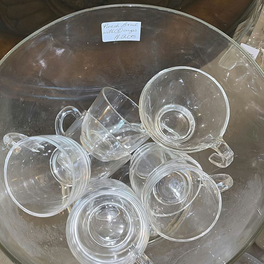 Clear glass teacups with saucers, champagne flute, decanter, and pink hydrangea centerpiece - image 5 of 5
