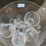 Clear glass teacups with saucers, champagne flute, decanter, and pink hydrangea centerpiece - thumbnail 5 of 5