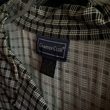 Assorted shirts and blouses on closet hangers - thumbnail 3 of 5