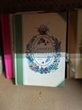 Assorted Christmas-themed decor and vintage photo albums - thumbnail 17 of 19