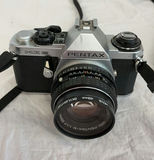 Two vintage film cameras: Kodak Vigilant Junior Six-20 folding camera and Pentax ME Super 35mm SLR - thumbnail 2 of 6
