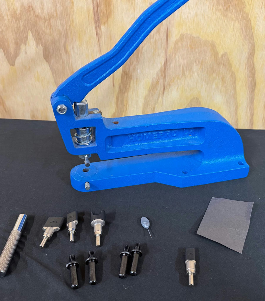 Blue manual press with interchangeable rivet and snap-fastener dies - image 1 of 3
