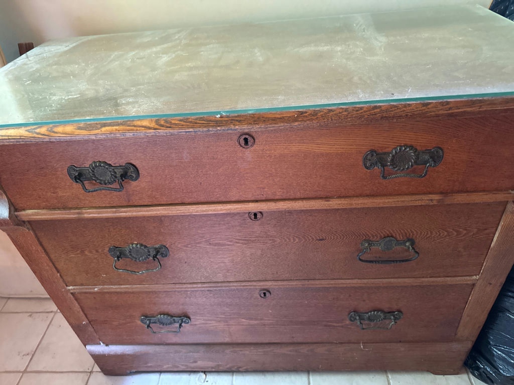 Three-drawer wooden dresser with glass top - image 2 of 2