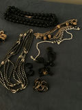 Assorted black and gold jewelry set (necklaces, earrings, rings, bracelets) - thumbnail 3 of 3