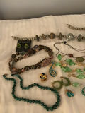Assorted jewelry: necklaces, bracelets, earrings, and rings - thumbnail 2 of 3