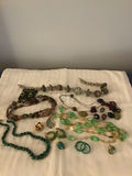 Assorted jewelry: necklaces, bracelets, earrings, and rings - thumbnail 1 of 3