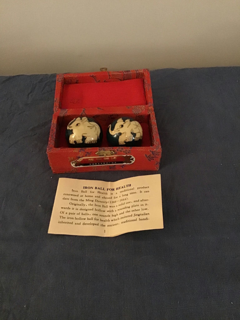 Red fabric box with two dark blue health balls - image 1 of 3