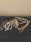 An assortment of white bead jewelry - thumbnail 1 of 1