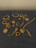 Assorted gold jewelry - pins, rings and bracelets - thumbnail 1 of 3