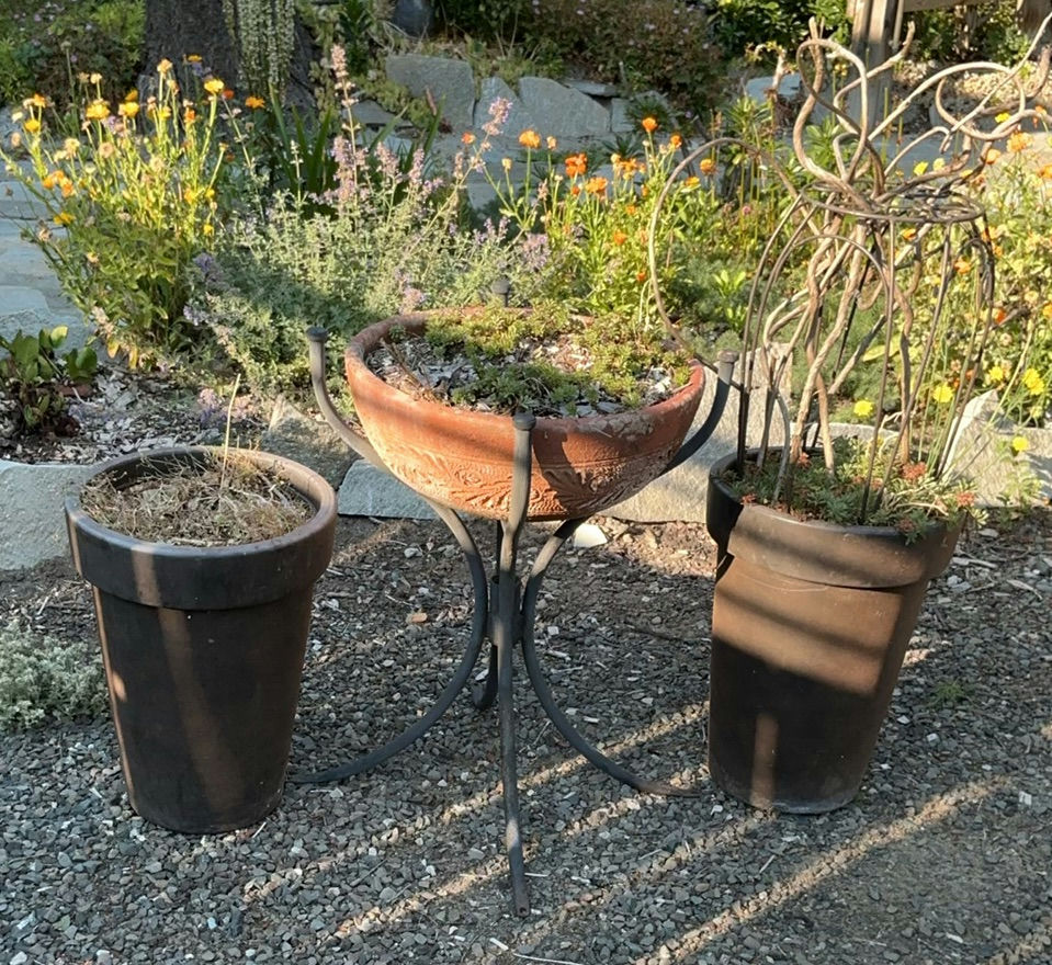 Unique Ceramic Planter On Stand And Pair Of Tall Plastic Planters - image 1 of 5
