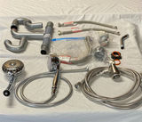 Shower head with hoses and assorted plumbing fittings - thumbnail 1 of 6