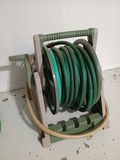 Assorted garden hoses and hose reel - thumbnail 2 of 4