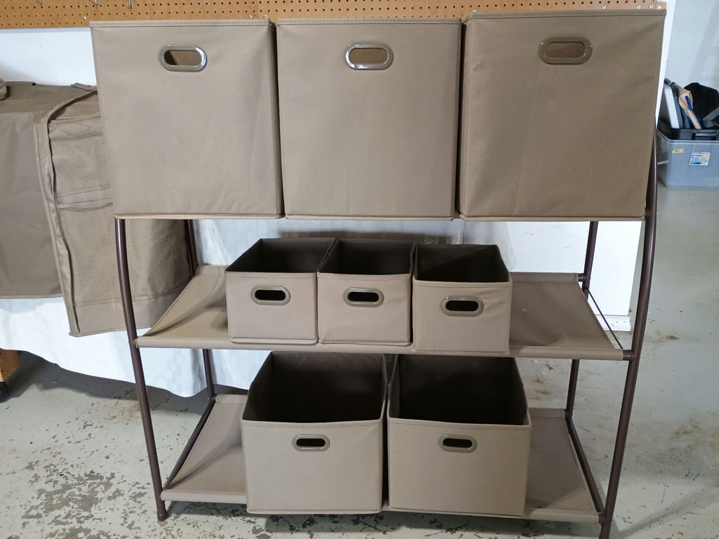 Metal framed storage rack with fabric bins - image 1 of 4