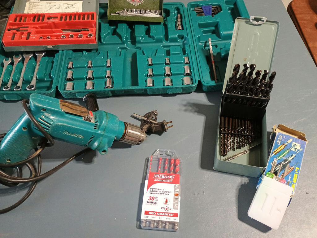 Makita Corded drill with drill bits, wrenches, and socket sets - image 1 of 8