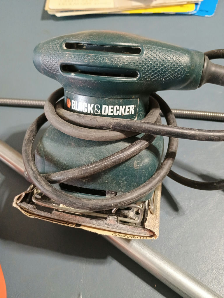 Power tools, glue gun, heat gun, and sanding supplies - image 8 of 10