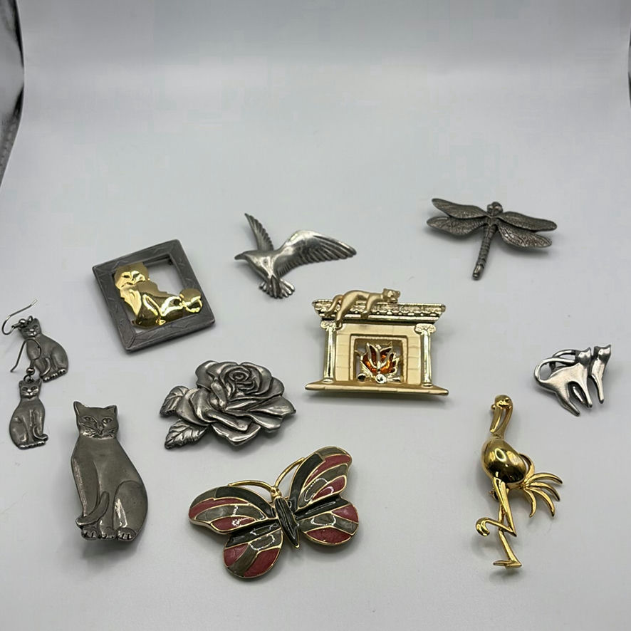 Pewter Brooches And Others - image 1 of 16