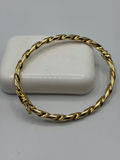 14k Yellow Gold Twisted Bangle Bracelet - thumbnail 1 of 8