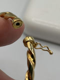 14k Yellow Gold Twisted Bangle Bracelet - thumbnail 4 of 8