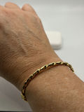 14k Yellow Gold Twisted Bangle Bracelet - thumbnail 6 of 8