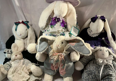 Group of plush bunny toys in decorative outfits - Image 1 of 14