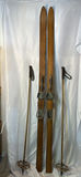 Vintage wooden skis with metal bindings and ski poles - thumbnail 1 of 9
