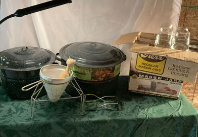 Canning supplies: Mason jars, lids, enamelware pots, and jar rack - Image 1 of 8