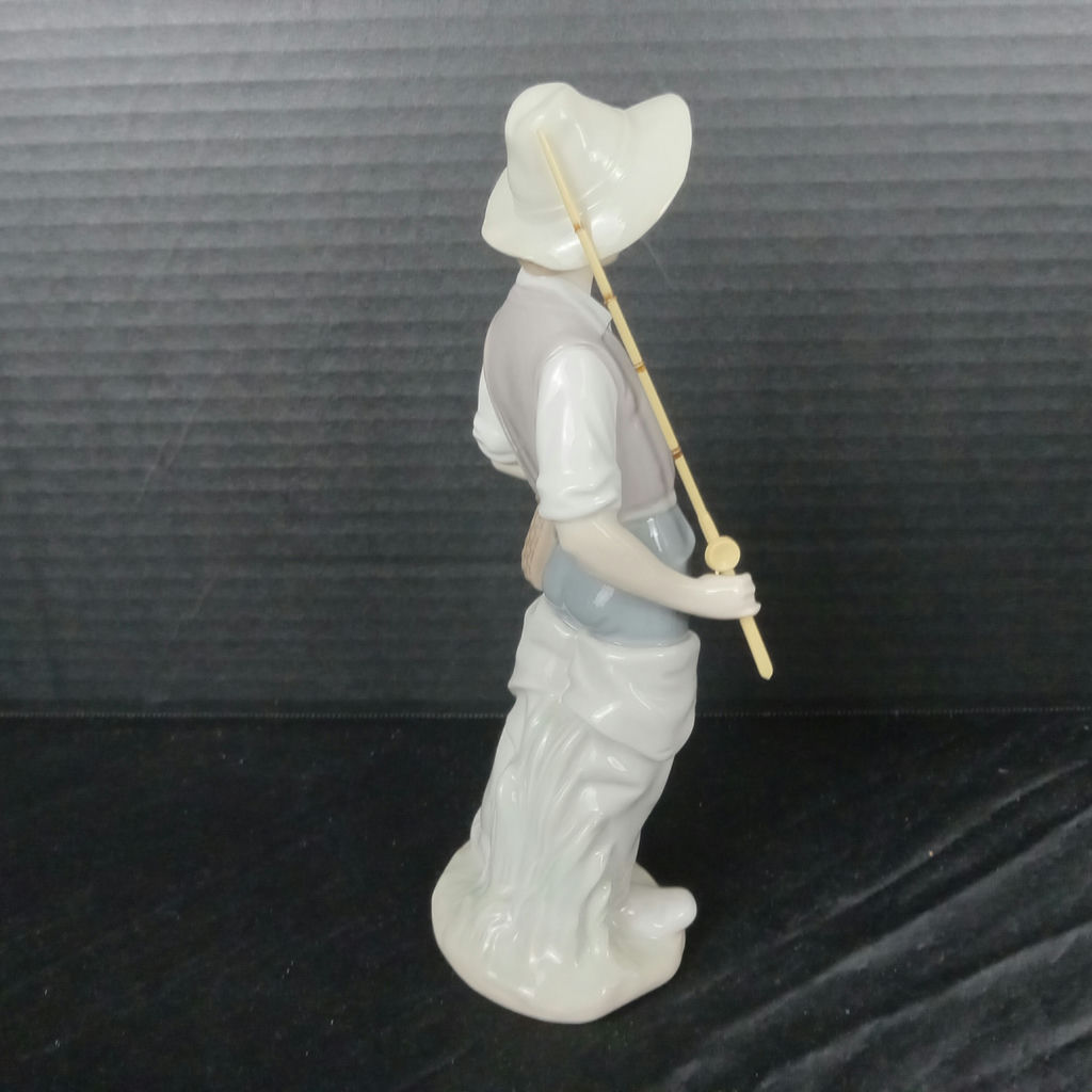 Lladro Boy w/Fishing Pole Figurine - image 2 of 6